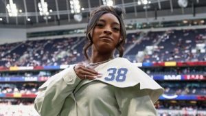 Simone Biles became emotional as she prepared to part ways with the Houston-area home she had