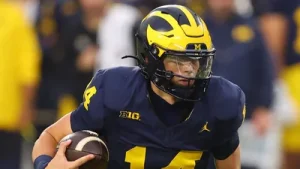 Michigan QB Tommy Carr comes from Wolverines football royalty, with his grandfathers leaving