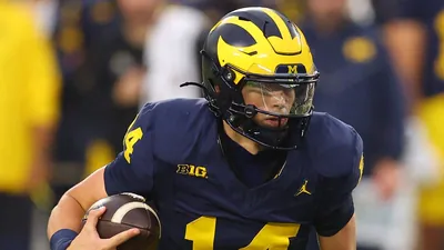 Michigan QB Tommy Carr comes from Wolverines football royalty, with his grandfathers leaving